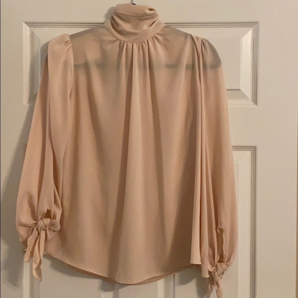 Pale pink, high neck blouse